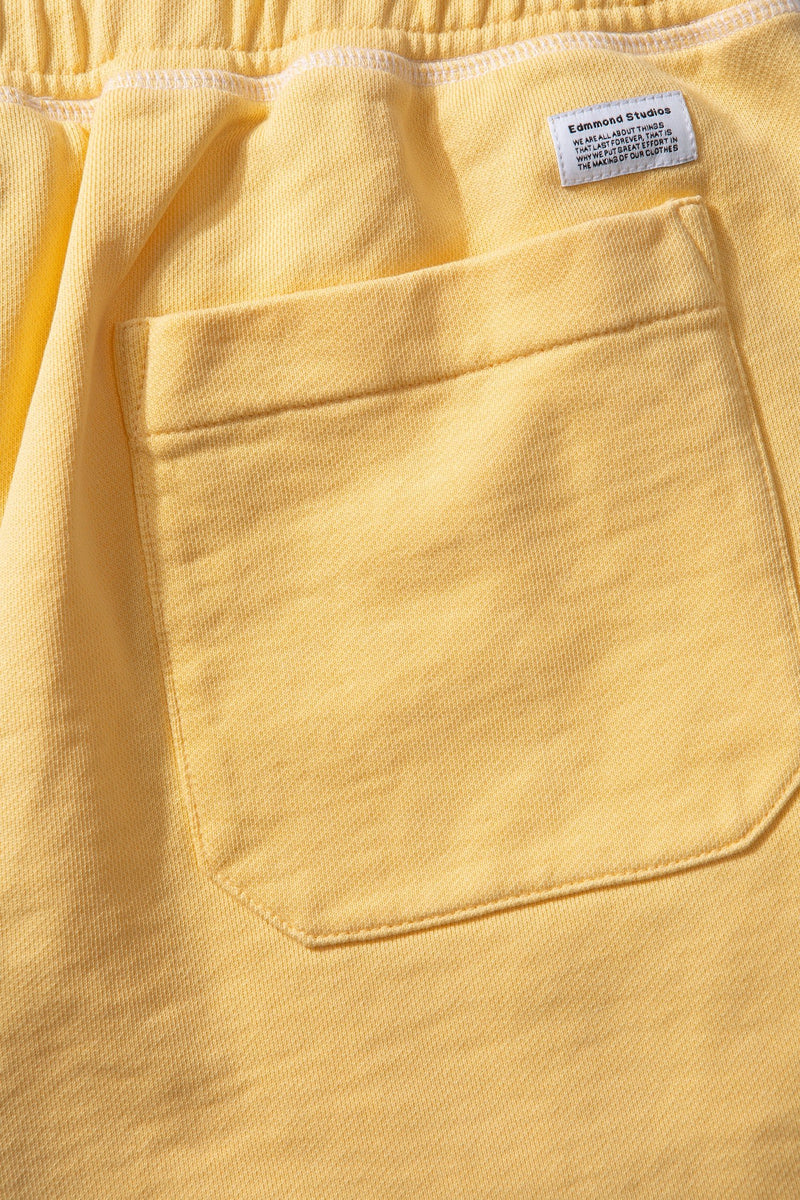 COLLEGE ARCH SHORTS LIGHT YELLOW